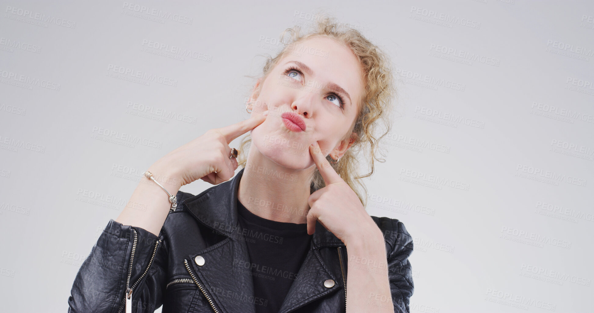 Buy stock photo Funny face, pout and thinking with woman in studio for comic, meme and vision. Facial expression, comedy and reflection with person on white background space for good mood, goofy or silly personality