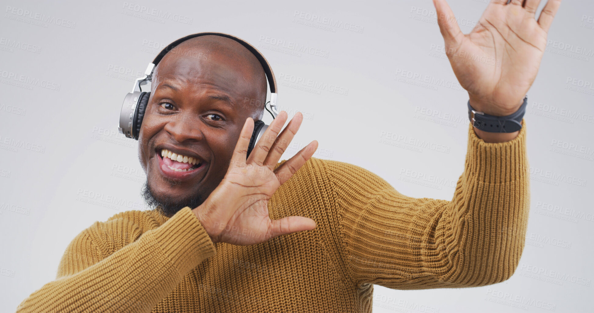 Buy stock photo Black man, happy and dancing with headphones in studio with album, streaming or song on white background. African person, portrait and listen to music with subscription, radio or rhythm in Nigeria