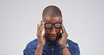 Black man, headache and glasses with fatigue in studio with mockup space, tired or vertigo on white background. Person, chronic migraine and burnout with brain fog, eye pain and temple massage