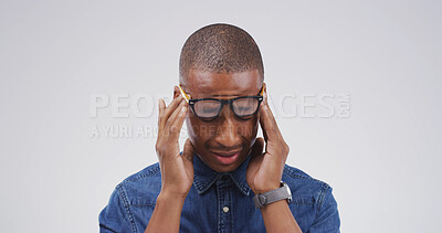Buy stock photo Black man, headache and glasses with fatigue in studio with mockup space, tired or vertigo on white background. Person, chronic migraine and burnout with brain fog, eye pain and temple massage