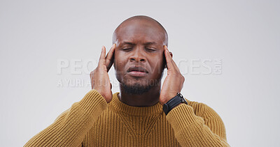 Buy stock photo Stress, migraine and black man in studio with pain, brain fog and fibromyalgia on white background. Headache, tired and sick person with mental health crisis, burnout and massage temples for relief
