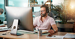 Businessman, computer and communication with headset at call center for online advice or customer service. Man, agent or consultant talking with mic on technology for support, assistance or help