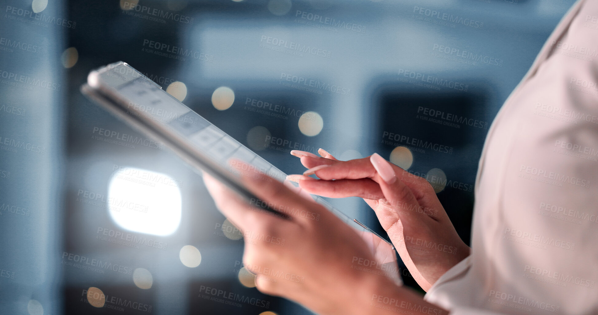 Buy stock photo Hands, tablet and typing at night in office, overtime or project management for job at startup company. Person, digital touchscreen and application with review, feedback or scroll at creative agency