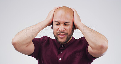 Buy stock photo Pain, headache and man in studio with stress, frustrated or financial crisis with fail. Tension migraine, sick person and challenge with mistake, bankruptcy or debt with burnout on white background