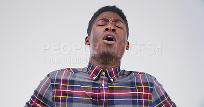 Buy stock photo Sick, sneeze and black man in studio with allergy, flu or bacteria with health risk. Respiratory disease, problem or African model with cold, hay fever or virus infection isolated on white background