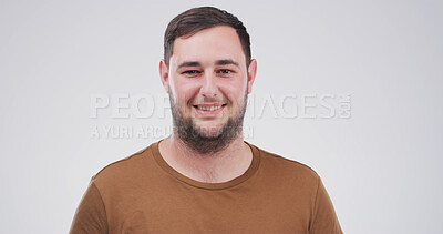 Buy stock photo Portrait, creative and man with smile in studio for career pride, about us and journalist ambition. Happy, male person and reporting news, story writer and article publication on white background

