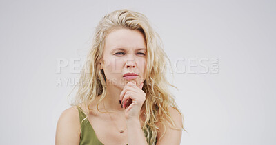 Buy stock photo Confused, uncertain and woman with thinking in studio for decision, planning and solution to doubt. Mockup space, person and suspicious on white background for fake news gossip, contemplating or liar