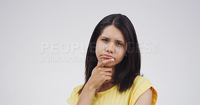 Buy stock photo Thinking, ideas and portrait of woman in studio with uncertain for decision, brainstorming or question. Choice, mockup space and person with problem solving, planning or doubt by white background.