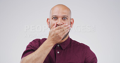 Buy stock photo Surprise, rumor and portrait of man in studio with omg, wow and wtf face expression. Shocked, announcement and male person from Colombia with reaction to gossip or competition by white background.