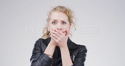 Buy stock photo Terror, shocked and portrait of woman in studio with omg, wtf or wow reaction for news. Emotion, surprise and female person with hands covering mouth for rumor or announcement by white background.