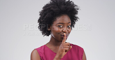 Buy stock photo Black woman, portrait or finger with rumor, studio and silence for mystery announcement. Model, gossip and secret with hush, whisper and gesture for news, opinion or privacy on white background space
