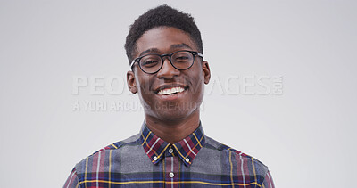 Buy stock photo Portrait, nerd and black man in studio as student for scholarship, learning or college education. Smile, learner and geek with glasses for university with happiness on white background space in Kenya