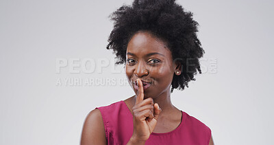 Buy stock photo Gossip, hush and portrait with black woman on studio space for privacy, silence or whisper. Emoji, finger on lips and secret with person isolated on white background for confidential information