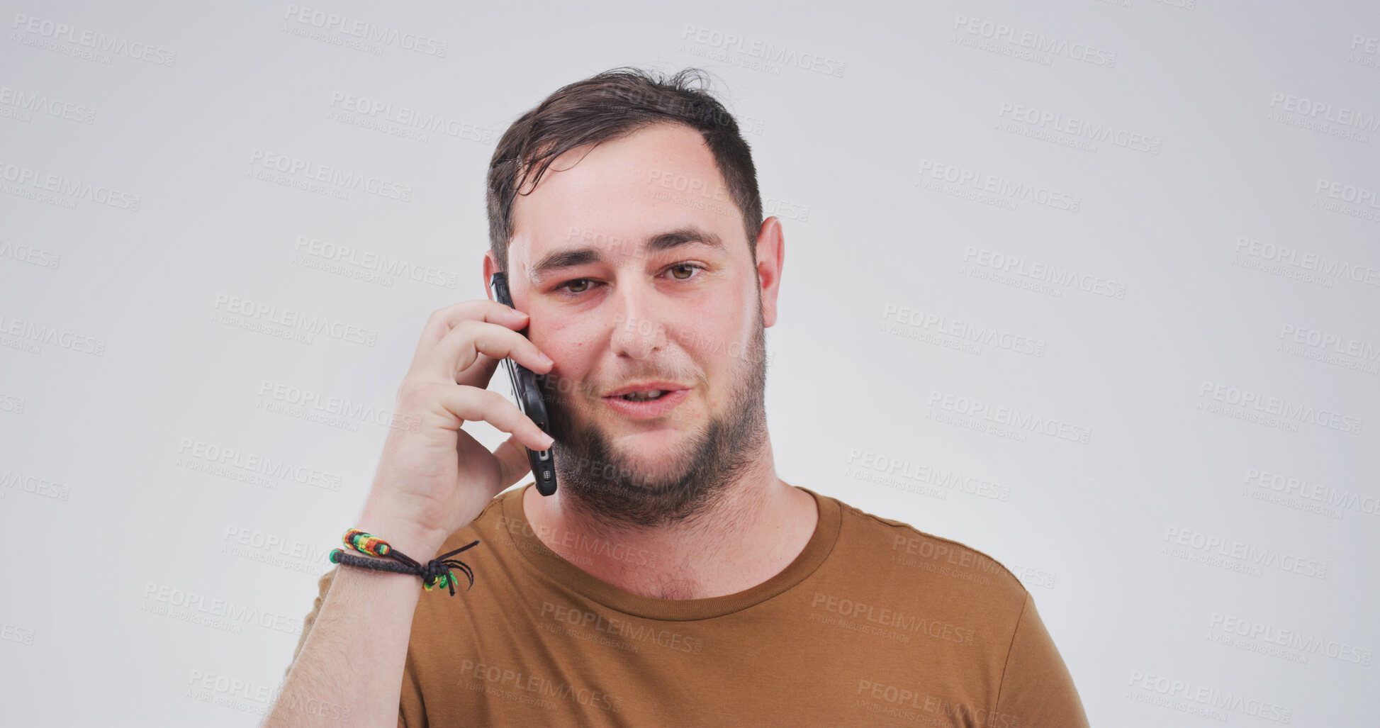 Buy stock photo College, phone call and portrait with man on studio space for conversation or study schedule. Communication, mobile and update with student isolated on white background for university feedback