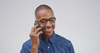Buy stock photo Happy, black man and talking with phone call in studio for campaign feedback, good news or chat. Creative, mockup space or person speaking to contact for networking or negotiation on white background