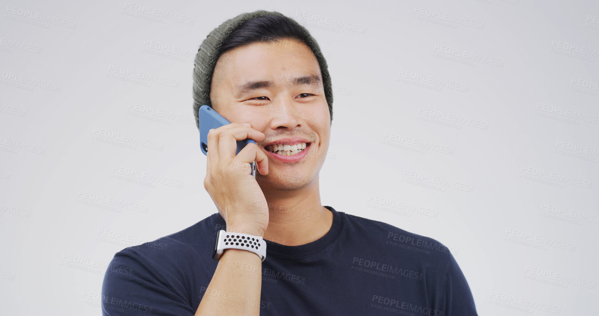 Buy stock photo Asian man, happy and phone call in studio for communication, contact or chat on white background. Smile, male person with mobile conversation or networking for connection, space or technology