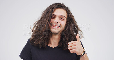 Buy stock photo Man, portrait and smile with thumbs up in studio, motivation or promotion with praise. Agreement, success or hand gesture for yes, thank you or feedback with sign for review on white background