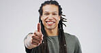 Happy man, portrait and winning with thumbs up in studio for good job on a white background. Male person, model or smile with like emoji, yes sign or OK for well done, thank you or success on space