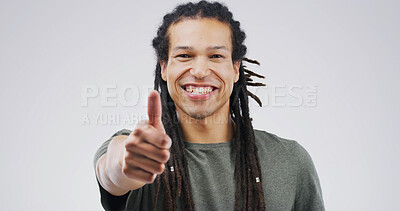 Buy stock photo Happy man, portrait and winning with thumbs up in studio for good job on a white background. Male person, model or smile with like emoji, yes sign or OK for well done, thank you or success on space