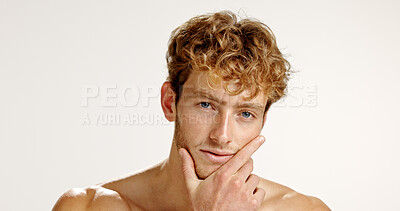 Buy stock photo Studio, serious and skincare for man, portrait and facial treatment for glow, dermatology and shine. White background, person and wellness of skin with cosmetics, space or self care for beauty in USA