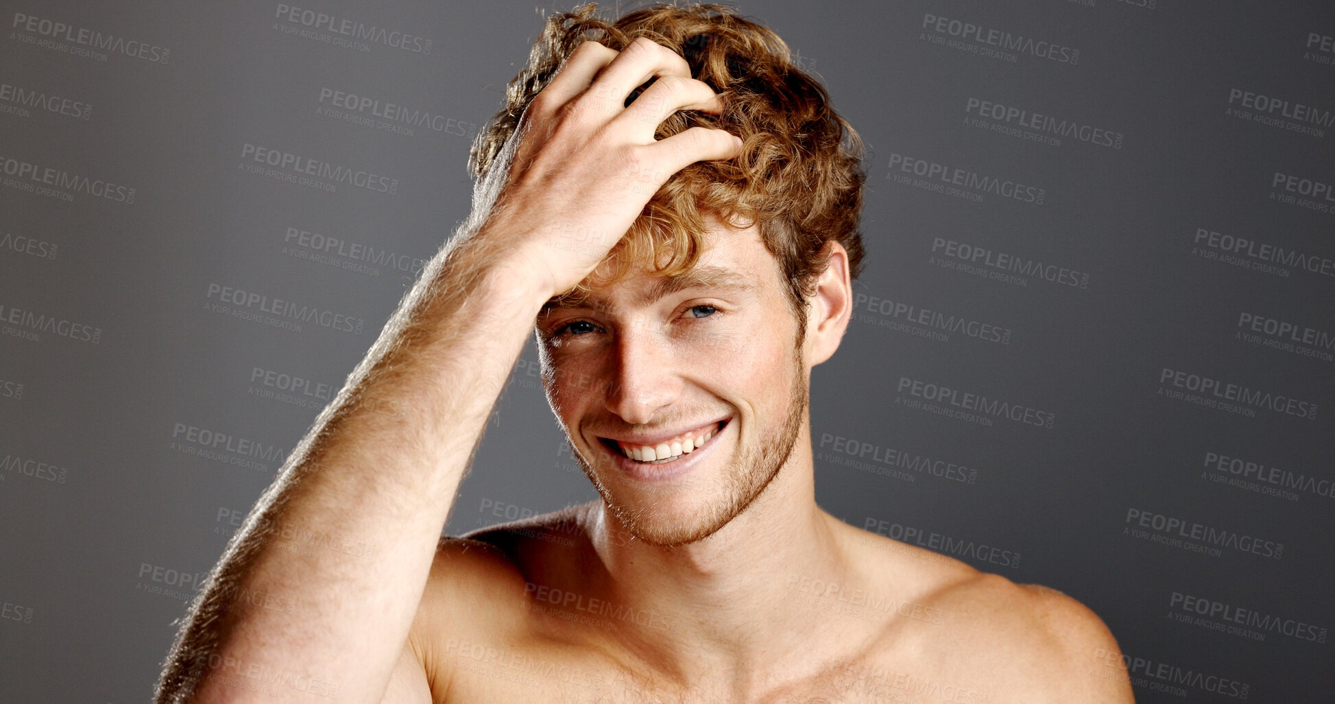 Buy stock photo Portrait, happy man and hair care in studio for beauty, grooming and texture on gray background. Face, hairstyle and male person at salon for scalp treatment, barber or growth cosmetics for aesthetic