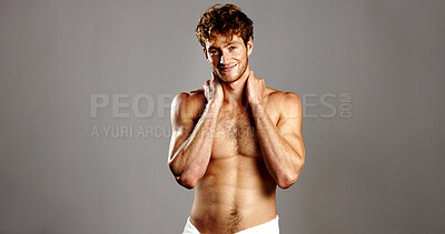 Buy stock photo Portrait, man and confidence for skincare in studio for natural beauty, facial treatment and abs. Smile, male person and shirtless for dermatology glow, grooming routine and muscle on gray background