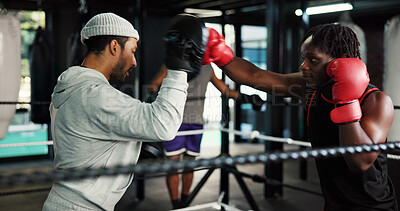 Buy stock photo Exercise, teamwork and training with people in boxing ring for combat, self defense or sparring. Boxer, challenge and fight with men punching in gym for competition, fitness or performance as athlete