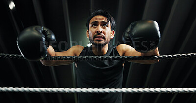 Buy stock photo Sport, boxer and man on rope for break, tired or health recovery for fitness. Athlete, boxing ring and rest in gym with fatigue, sweat or exhausted after fight challenge for intense workout below