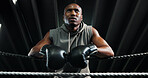 Sport, boxing ring and tired black man on rope for relax, rest or health recovery for fitness. Athlete, boxer and break in gym with fatigue, sweat or fight challenge for intense workout in low angle