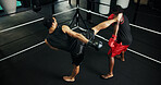 Gym, kick and training with people in boxing ring for sports, fitness or sparring. Boxer, challenge and self defense with men together in combat for competition, exercise or performance as athlete