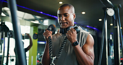Buy stock photo Strong, fitness and black man with rope machine, exercise and wellness in bodybuilding. Male person, cable or athlete in training with gym equipment for health, power and workout for biceps or muscle
