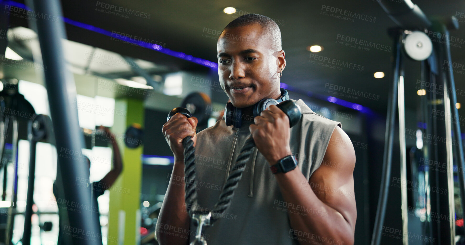 Buy stock photo Strong, fitness and black man with rope machine, exercise and wellness in bodybuilding. Male person, cable or athlete in training with gym equipment for health, power and workout for biceps or muscle
