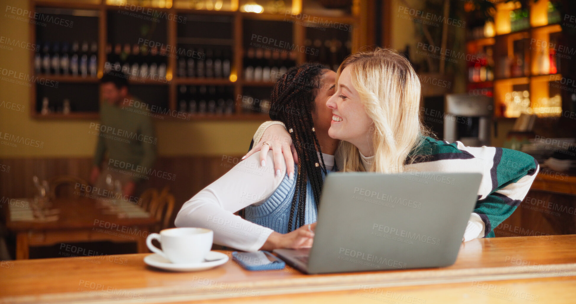 Buy stock photo Women, friends and hug in coffee shop with laptop, break or bonding together. Girls, technology and embrace in cafe for catchup, communication and social gathering with latte for gossip discussion