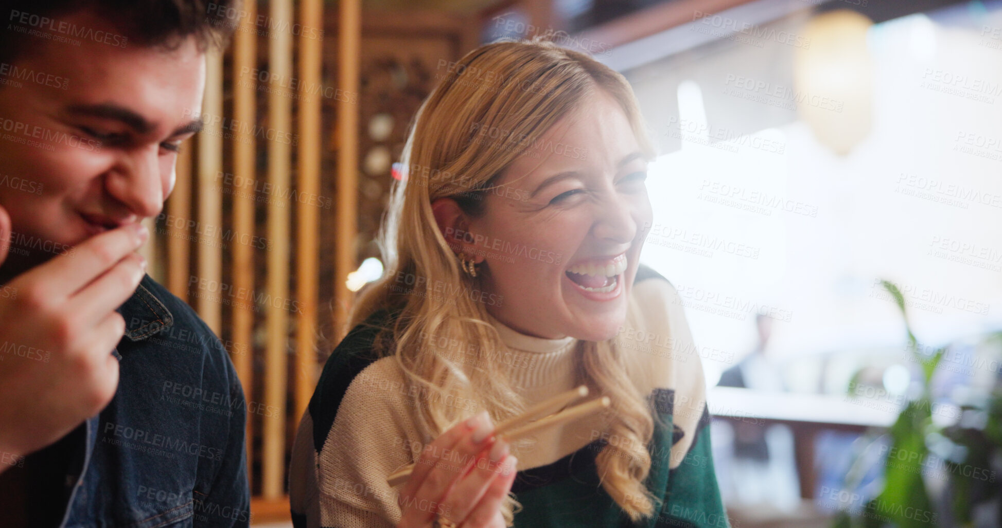Buy stock photo People, eating and laugh with food at restaurant for lunch, bonding together and birthday event. Happy, friends and funny joke with sushi, local asian cuisine and dinner date for social celebration