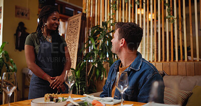 Buy stock photo Smile, man and waitress with food at restaurant for lunch, healthy nutrition and server help. Happy, people and waiting for friends to eat sushi, local asian cuisine and meal for social celebration