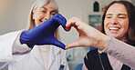 Dentist, heart hands and smile with people in office for consulting, support and oral hygiene. Teeth cleaning, healthcare and trust with women in dental clinic for orthodontist treatment and advice