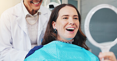 Buy stock photo Teeth, happy and mirror with woman at dentist for dental care, treatment and fresh breath. Cleaning, tooth whitening and person smile for oral hygiene, orthodontics and wellness for veneer inspection