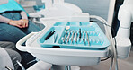 Dentist, tools and closeup of tray in clinic for healthcare, procedure and health consultation. Oral hygiene, dental person and specialist with mirror, excavator or orthodontic equipment for check up