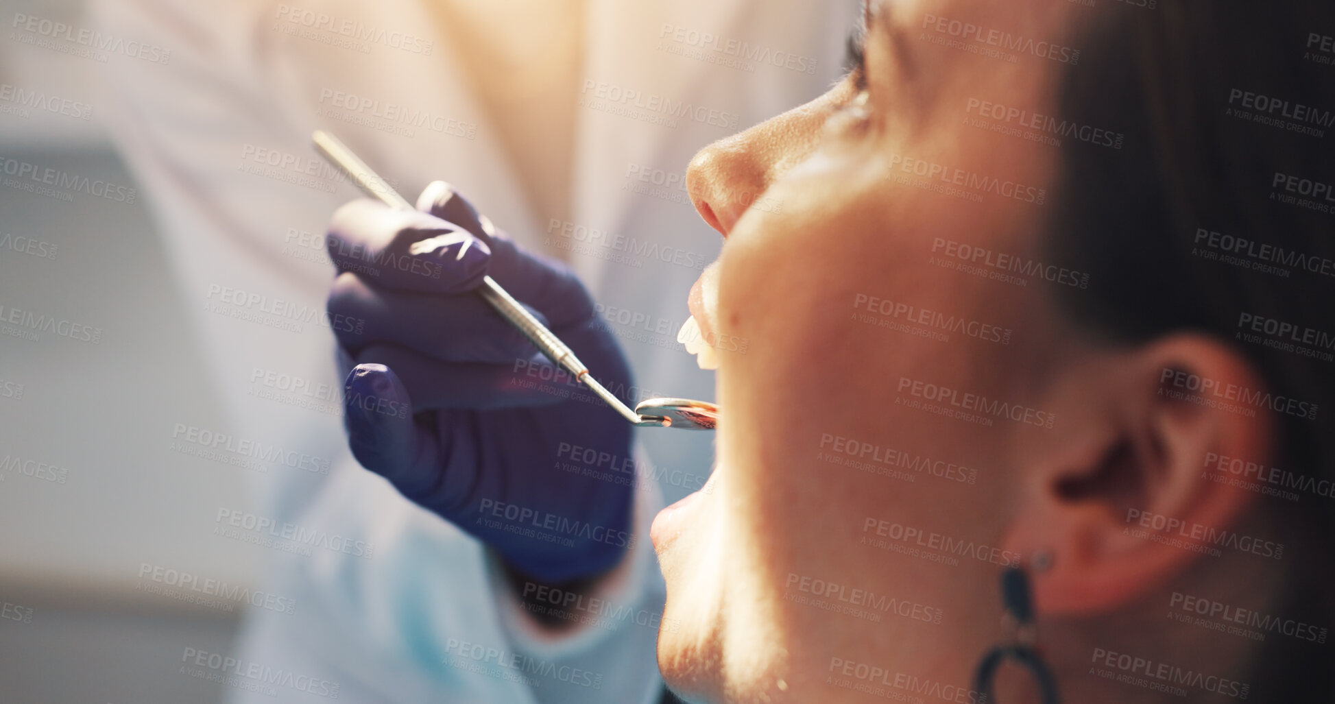 Buy stock photo Doctor, patient and hand with mirror at dentist for mouth inspection, gum assessment or exam. Dental care, gloves or woman with instrument for oral cavity, tooth decay or cleaning procedure in clinic