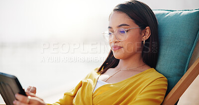 Buy stock photo Digital nomad, relax and woman with tablet in hotel for feedback, online review or tourism blog. Outdoor, freelancer and on chair for remote work, break or research for travel article or hospitality