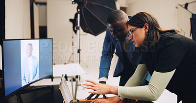 Buy stock photo Computer, photographer and people in studio talking with results for editing, selection and process. Photography, creative and woman with male model on tech for post production, planning and design