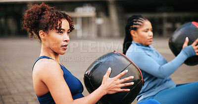 Buy stock photo Fitness, medicine ball and teamwork with women in city for challenge, workout and performance. Health, wellness and commitment with friends outdoor for training partner, exercise club and sports