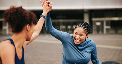 Buy stock photo Fitness, exercise and friends with high five in city for workout success, teamwork or achievement. Athlete, women and happy with celebration outdoor for wellness goals, training progress and support