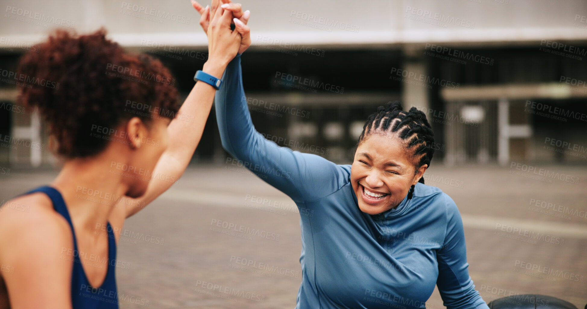 Buy stock photo Fitness, exercise and friends with high five in city for workout success, teamwork or achievement. Athlete, women and happy with celebration outdoor for wellness goals, training progress and support