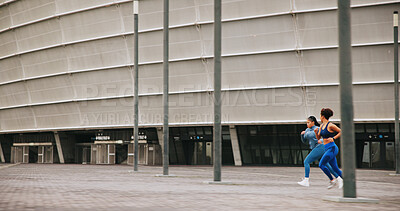 Buy stock photo Running, athlete and women on race, energy and practice for competition, speed or outdoor for sport. Fast, runner or training for marathon in city, African people and exercise for fitness or space