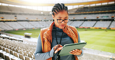 Buy stock photo Woman, coach and typing with tablet at stadium for sports event, competition or review for tactics. African person, tech and click with application for stats, decision or strategy for game in Kenya