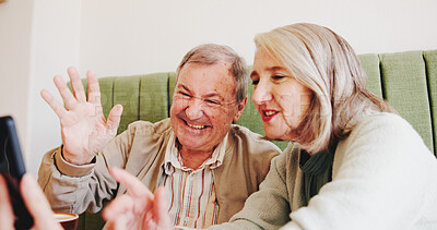 Buy stock photo Elderly couple, video call and phone at cafe with wave, happy and contact on web at restaurant. Senior people, man and woman with smartphone, mobile app and chat on social media at coffee shop