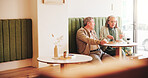 Talk, breakfast or elderly couple in cafe on date together in retirement for love, eggs or food. Relax, hungry or senior people in restaurant with lunch and care at diner for romantic anniversary