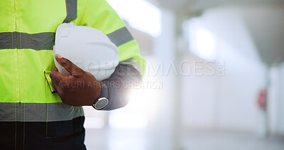 Buy stock photo Hands, engineer and person with helmet, protection and safety in construction site and architecture. Space, employee and hard hat for property development, contractor and maintenance of building