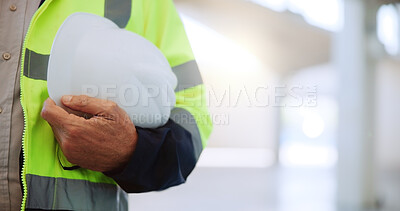 Buy stock photo Hands, engineer and person with helmet, safety and protection in construction site and architecture. Space, employee and hard hat for property development, contractor and maintenance of building